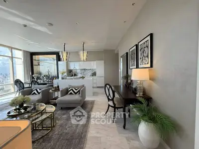 Luxurious open-plan living room with elegant decor and stunning city views