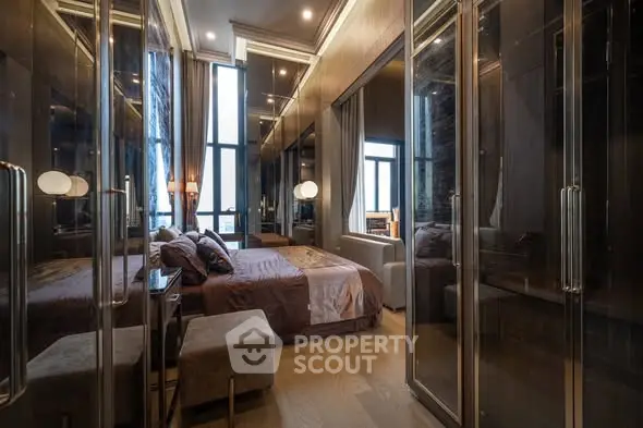 Luxurious modern bedroom with floor-to-ceiling windows and elegant decor.