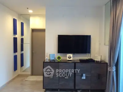 Modern living room with sleek TV setup and stylish decor