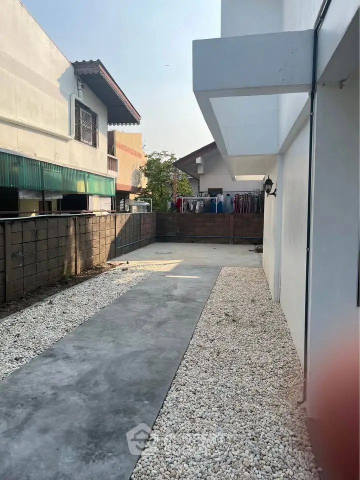 Spacious exterior area with modern design and ample sunlight, perfect for outdoor activities.