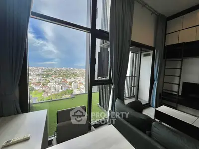 Stunning high-rise apartment with panoramic city view and modern interior design.