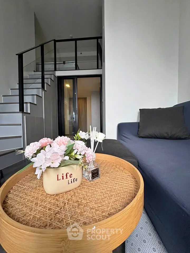 Modern living room with stylish loft design and cozy seating area