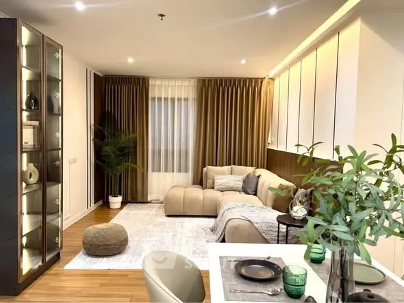 Luxurious modern living room with elegant decor and cozy seating area, perfect for relaxation and entertainment.