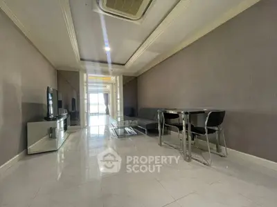 Spacious modern living room with sleek furniture and elegant decor