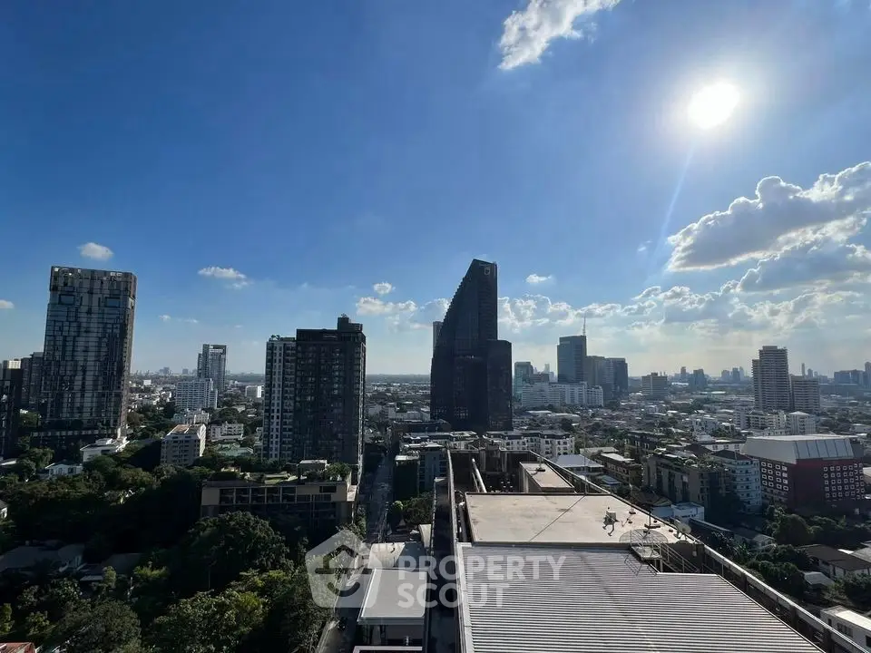 Stunning cityscape view with modern skyscrapers under a clear blue sky, perfect for urban living enthusiasts.