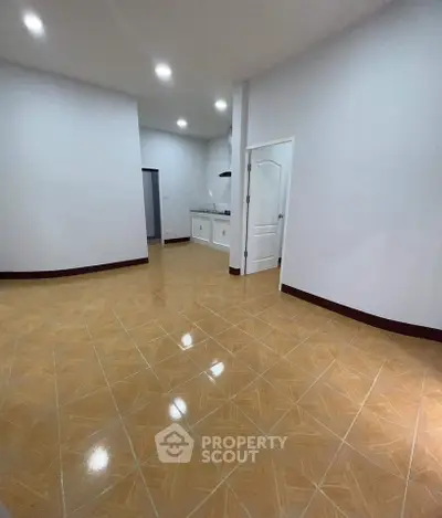 Spacious kitchen with modern design and tiled flooring