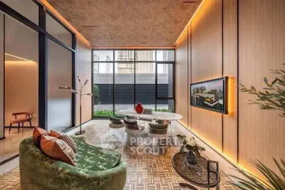 Luxurious modern living room with stylish decor and large windows offering natural light.