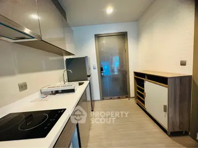 Modern kitchen with sleek appliances and minimalist design