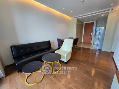 Spacious modern living room with elegant furniture and wooden flooring