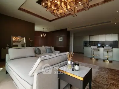 Luxurious modern living room with open kitchen and elegant chandelier