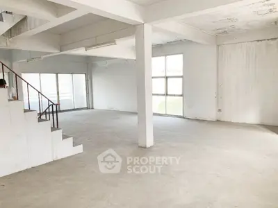 Spacious open-plan loft with abundant natural light, high ceilings, and a versatile layout, perfect for customization.