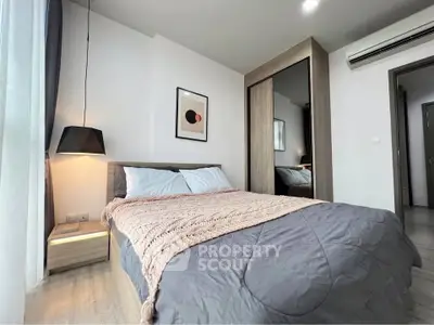 Modern bedroom with stylish decor and cozy ambiance