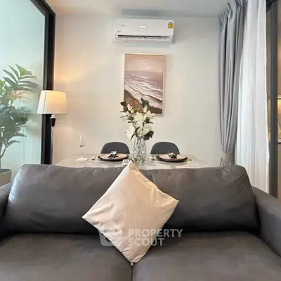 Modern living room with elegant dining area and stylish decor