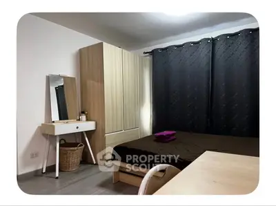 Cozy bedroom with modern furniture and stylish decor, perfect for relaxation and comfort.