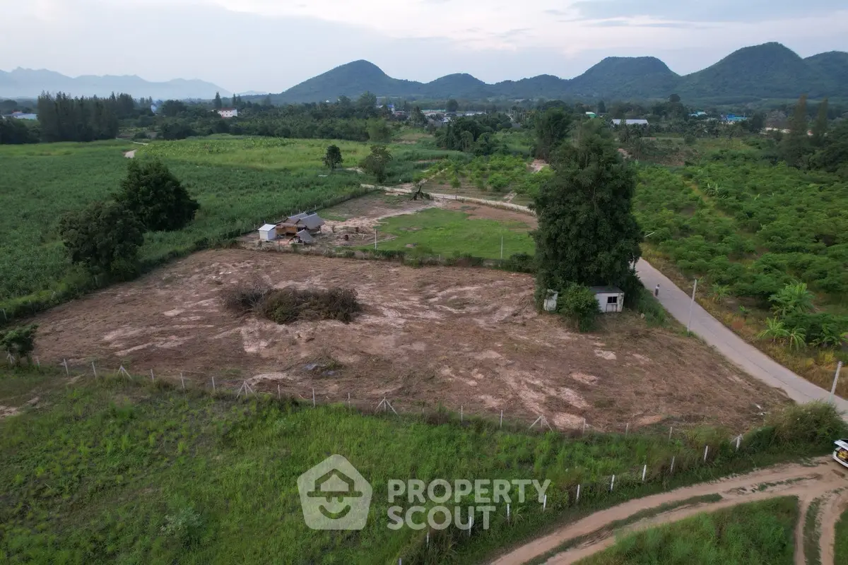 Expansive rural land with scenic mountain views, ideal for development or agriculture.