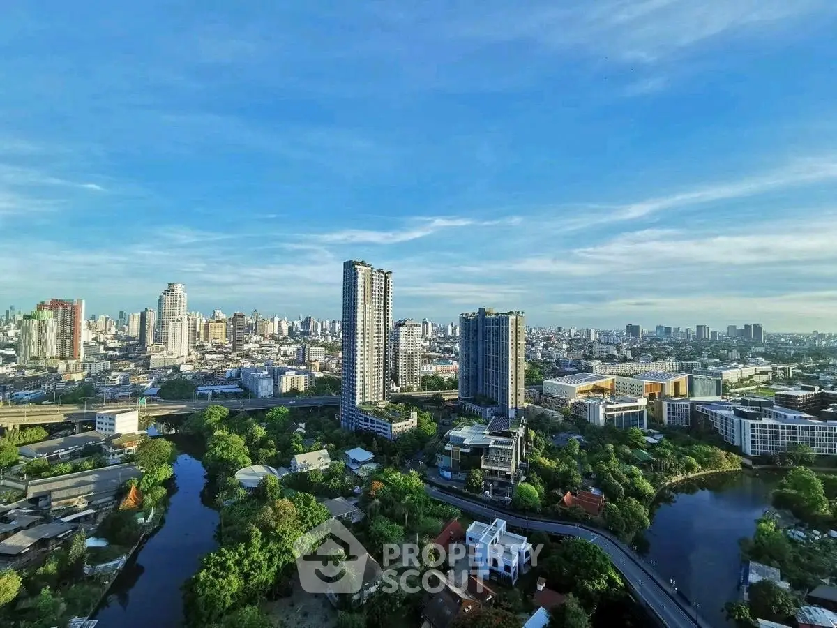 Stunning cityscape view with high-rise buildings and lush greenery, perfect for urban living enthusiasts.