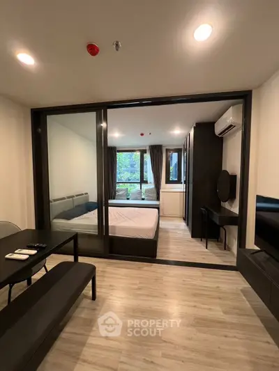 Modern studio apartment with sleek design and natural light