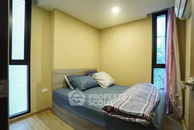 Cozy bedroom with modern decor and natural light