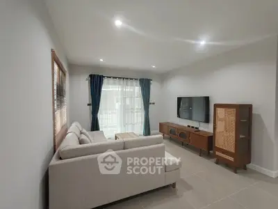 Modern living room with stylish furniture and natural light