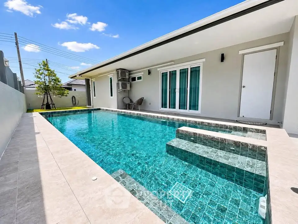 Luxurious modern home with private swimming pool and sleek design