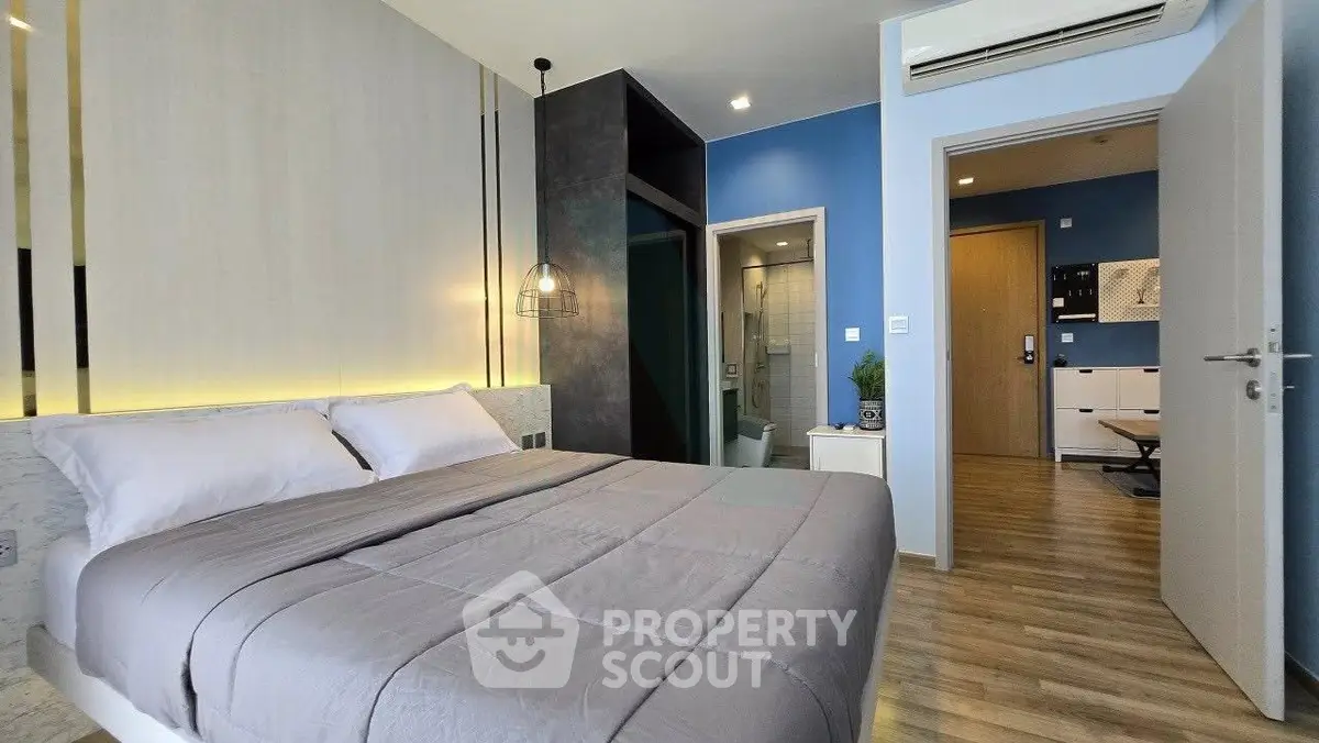 Modern bedroom with ensuite bathroom and stylish decor