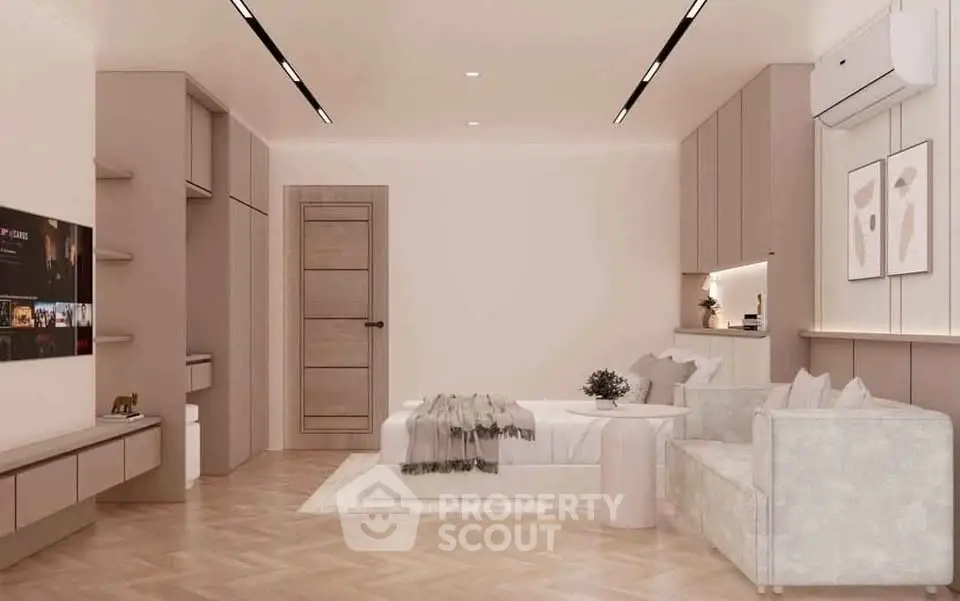 Luxurious modern bedroom with elegant decor and cozy seating area
