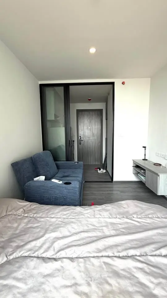 Modern apartment interior with cozy living area and stylish furniture