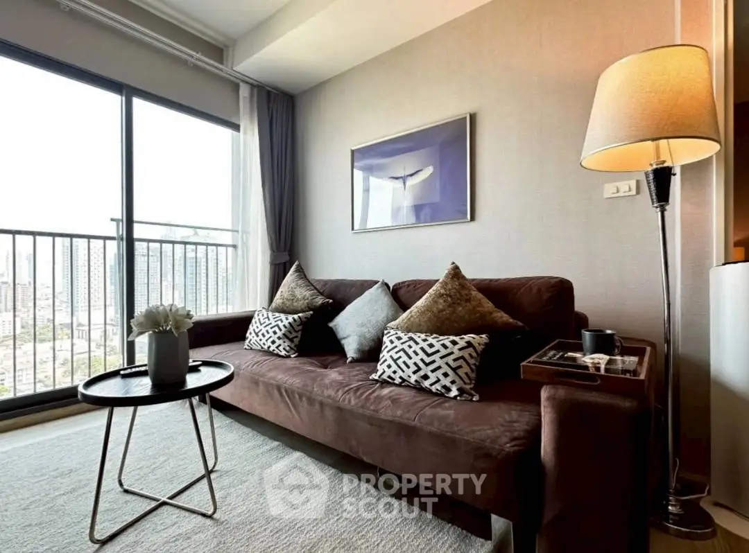 Stylish living room with city view, modern decor, and cozy seating area.