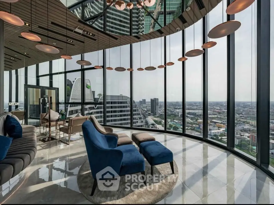 Luxurious high-rise living room with panoramic city views and modern furnishings.