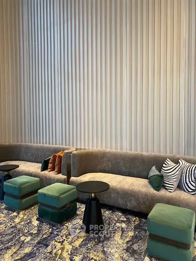 Luxurious modern living room with stylish seating and elegant decor