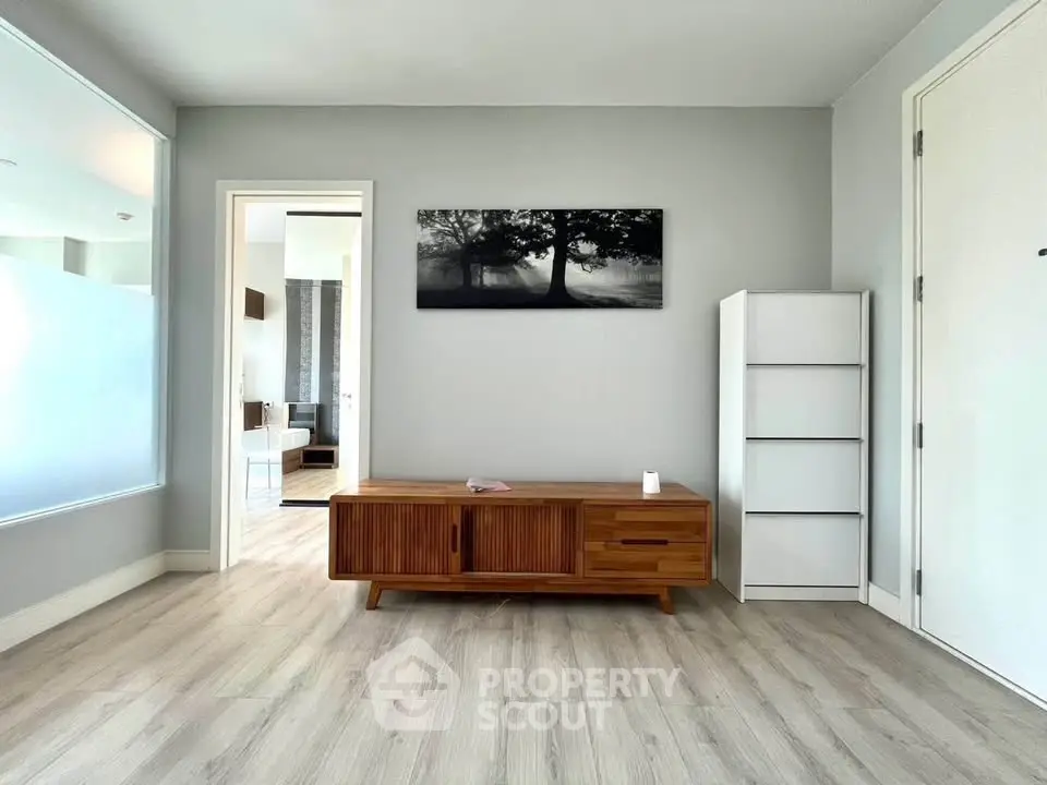 Modern living room with stylish wooden furniture and elegant decor