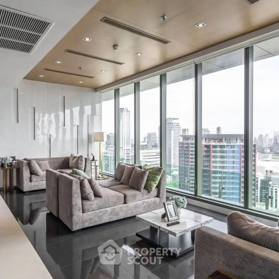 Luxurious living room with panoramic city view and modern furnishings