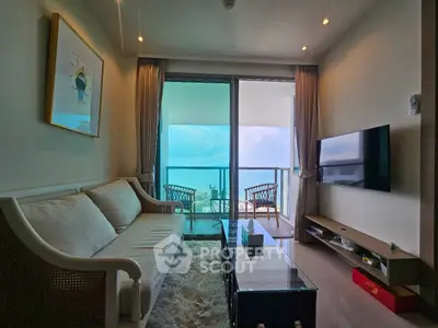 Luxurious living room with stunning ocean view and elegant decor