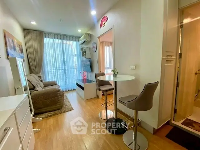 Modern living room with stylish decor and open layout in a cozy apartment.