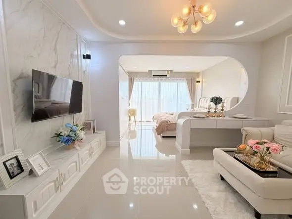 Luxurious open-plan living room with elegant decor and modern furnishings