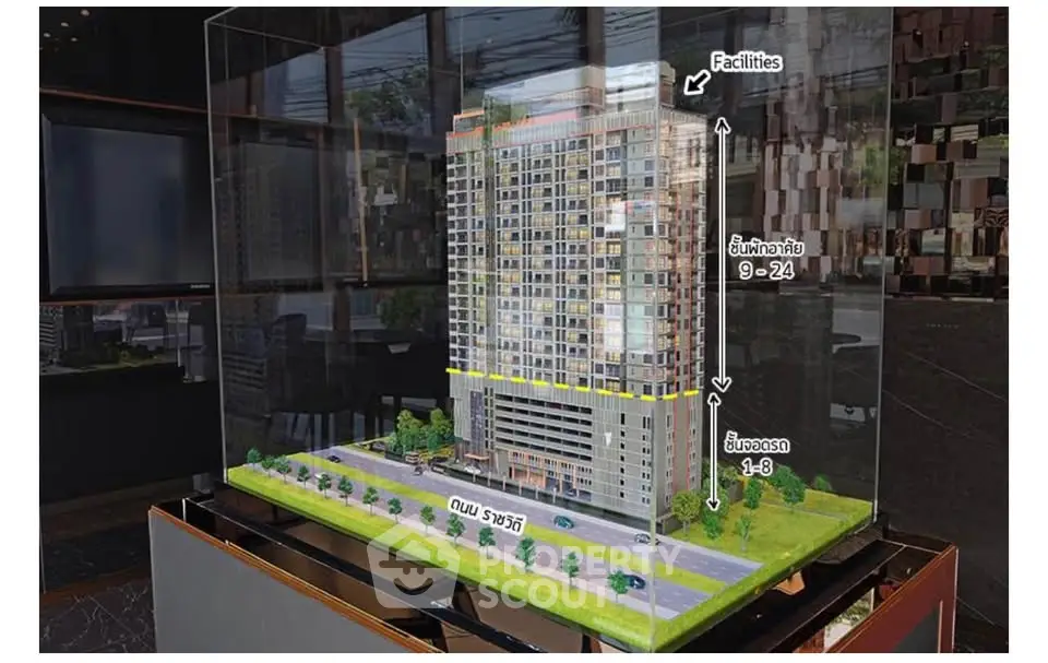 Modern high-rise building model showcasing urban living with detailed architectural features.