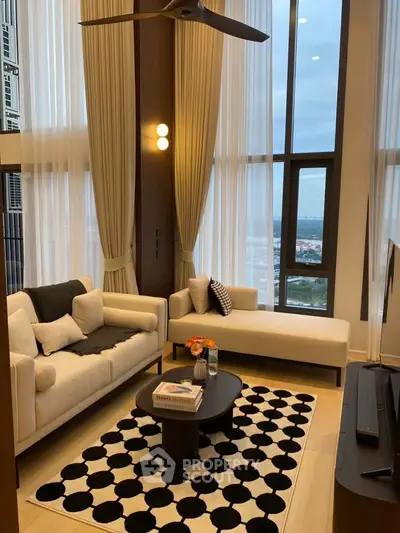 Luxurious high-rise living room with floor-to-ceiling windows and modern decor