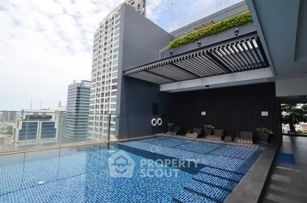 Luxurious rooftop pool with cityscape view and modern design