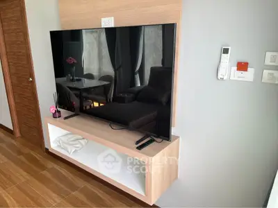 Modern living room with sleek TV setup and stylish decor