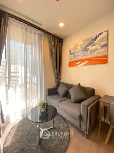 Modern living room with cozy sofa and balcony view