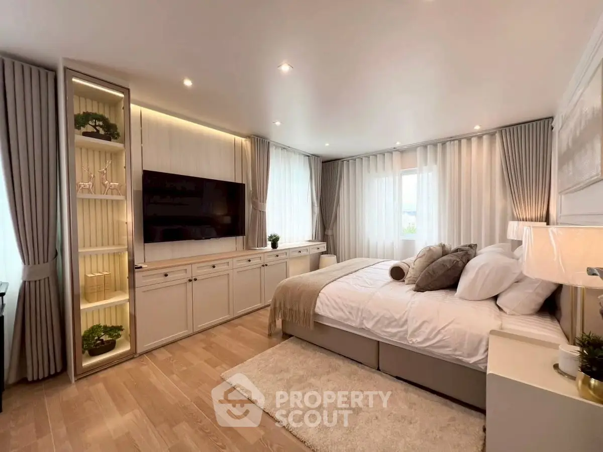 Luxurious bedroom with elegant decor and natural light