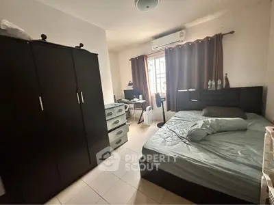 Cozy bedroom with modern furniture and natural light