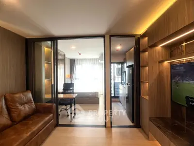 Modern living room with glass partition and cozy leather sofa