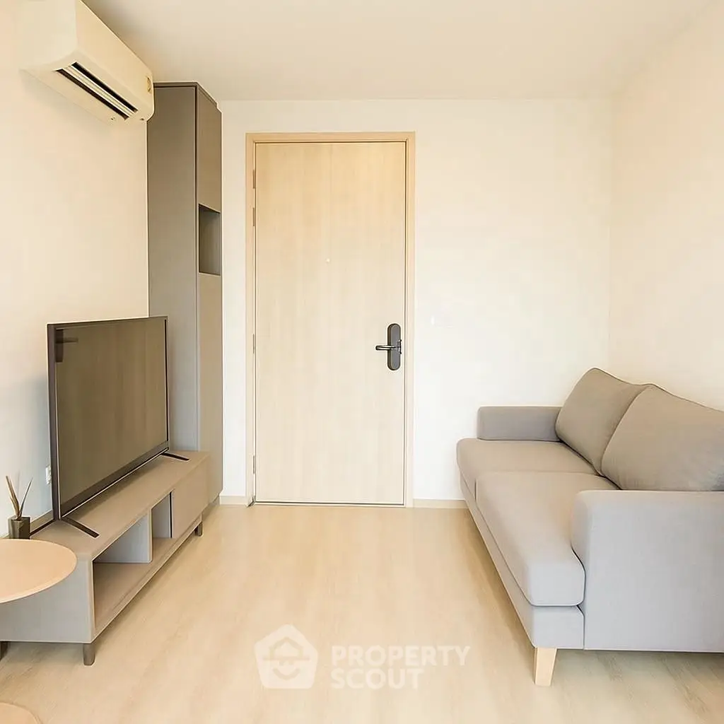 Modern minimalist living room with sleek furniture and neutral tones