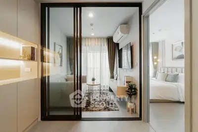 Modern apartment interior with sliding glass doors, cozy living room, and elegant bedroom.