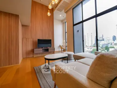 Spacious modern living room with city view and elegant furnishings