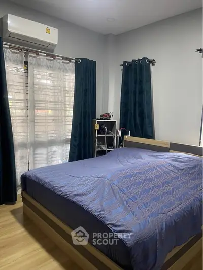 Cozy bedroom with modern decor and natural light