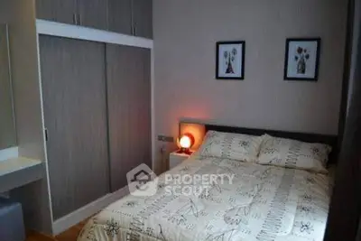 Cozy bedroom with modern decor and ample closet space