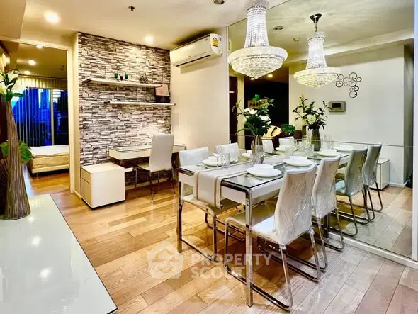 Elegant dining area with modern decor and ambient lighting in a stylish apartment.