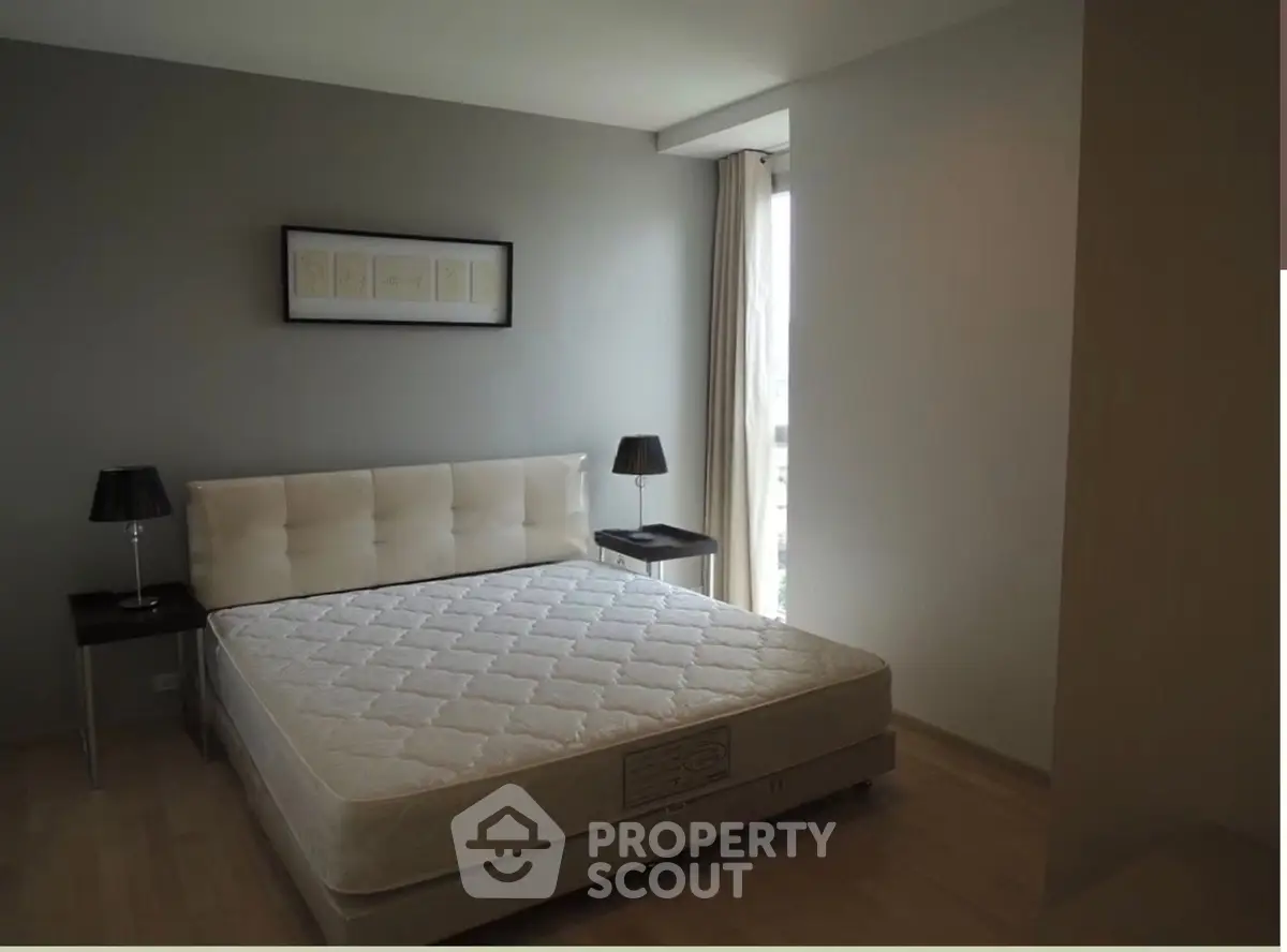 Modern minimalist bedroom with natural light and stylish decor